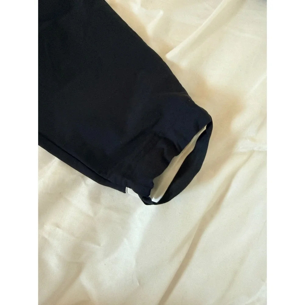 Nike Sportswear Tech Pack Stirrup Pants Black Tapered Knee Vent Women's Medium